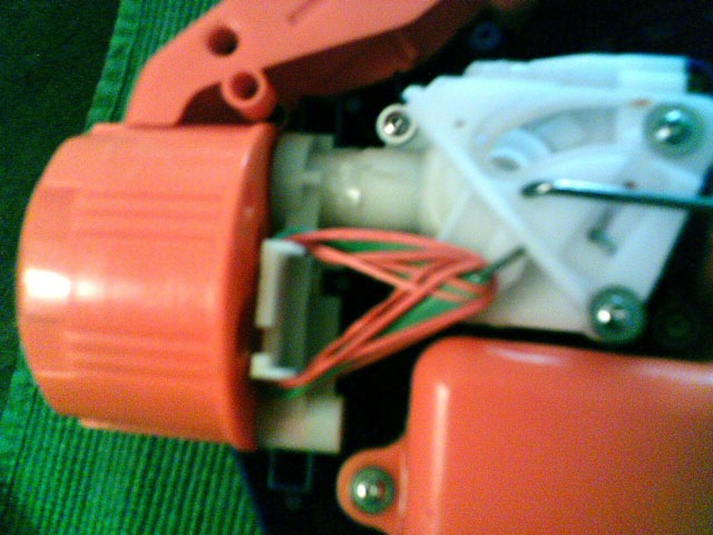 fixing a broken trigger spring on a Super Soaker Max Infusion Overload with rubber bands