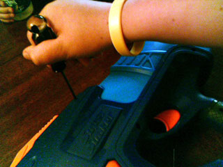 top two screws of Super Soaker Max Infusion Overload